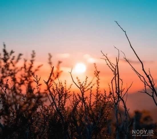  عکس طلوع خورشید از پشت پنجره