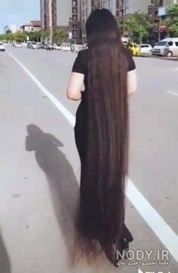  عکس دختر از پشت سر با موهای باز مشکی
